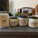 Various sizes of Spiced Woods Soy Candles